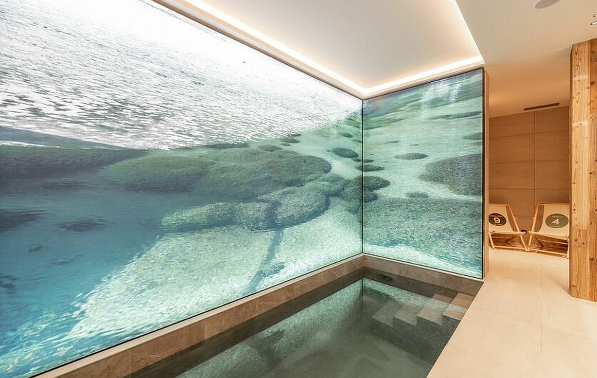 Relaxing indoor pool with calming views