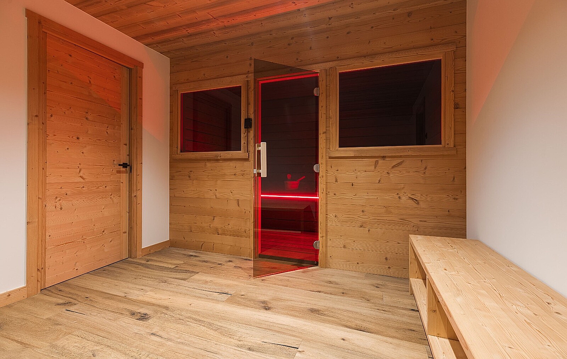Private sauna room with warm ambiance