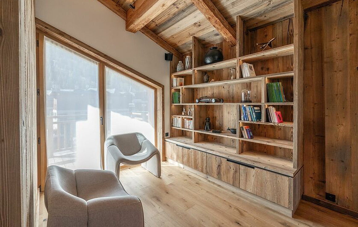 Cozy reading nook with built-in shelves