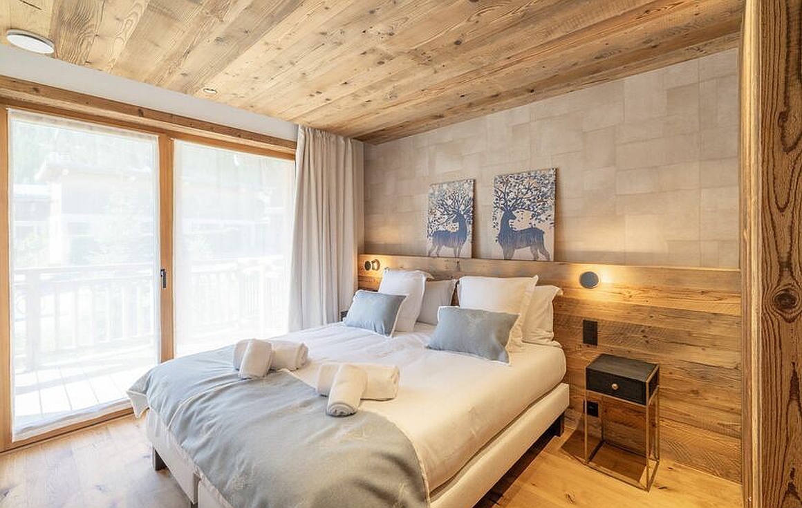 Elegant bedroom with warm wood accents
